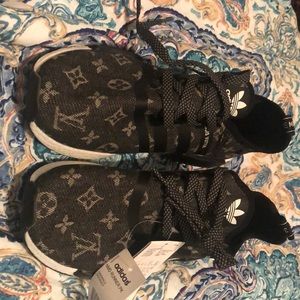Louis Vuitton Adidas size 7.5 but fit like an 8.5.